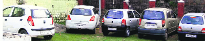 Vehicles await their turn for fixing of high-security number plates in Nurpur. 
