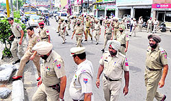 Police personnel deployed at Gian Rare Wala market following the High Courts orders