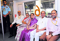 President Pratibha Patil, with her husband Devisingh Patil (2R) and Delhi CM Sheila Dikshit (4R), travels by Delhi Metro on Sunday
