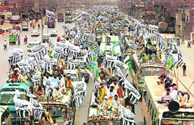 Supporters of the Defa-e-Pakistan Council take out a rally in Lahore on Sunday.