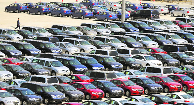 General Motors' new Chinese-made cars for domestic and foreign markets at a parking lot in Shenyang, Liaoning province. China is no longer the eye-popping growth story for GM, which along with other automakers is also facing sluggish sales in India where the overall market sentiment continues to remain depressed.  Reuters