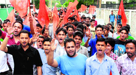 ABVP workers taking out a procession on the foundation day of the organisation in Dehradun on Monday.