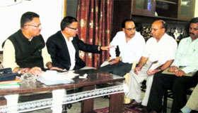 MLA Ganesh Joshi discusses development issues in Mussoorie on Monday.