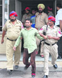 one of the accused being produced in the court in Jalandhar on Monday.