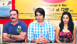 Yograj Singh along with other actors of new Punjabi film Yaaran Naal Baharaan-II addresses mediapersons in Jalandhar on Monday.