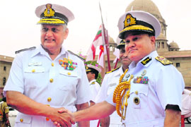 Naval Chief Admiral Nirmal Verma (L) shakes hands with Chief of the Naval Staff of Bangladesh Vice-Admiral Zahir Uddin Ahmed prior to a meeting at the South Block in New Delhi on Monday.
