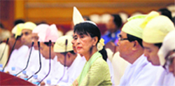 Aung San Suu Kyi attends a parliamentary meeting in Naypyitaw on Monday