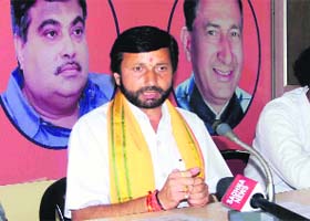 Senior BJP leader Prakash Pant addresses the media in Dehradun on Tuesday