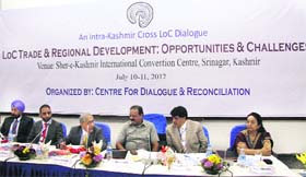Minister for Industries and Commerce S S Slathia chairs the inaugural session of the conference on cross-LoC trade, in Srinagar on Tuesday
