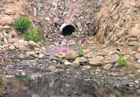 Pink water coming out of a new pipe in the Gandhi Nagar area