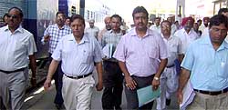 Commissioner, Railway Safety, Raj Kumar Kardam (second from left) and other officials arrive at Abohar on Wednesday morning