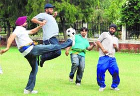 Fathers of students play a friendly match