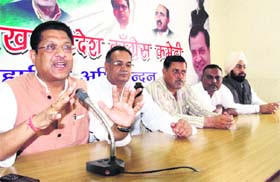 Uttarakhand Congress vice president Suryakant Dhasmana addresses a press conference in Dehradun on Wednesday