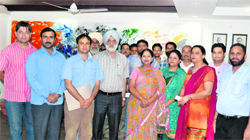 Jammu University Vice-Chancellor Prof MPS Ishar with the staff and a NAAC team in Jammu. A Tribune photograph