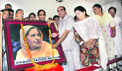 Members of the JK National Conference pay tributes to Madr-e-Meherban Begum Akbar Jahan on her death anniversary in Jammu on Wednesday. Tribune photo: Anand Sharma
