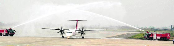 The maiden flight of SpiceJet from New Delhi to Amritsar gets water salute after it lands at Sri Guru Ramdas Jee International Airport in Amritsar on Thursday.
