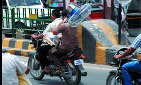 With the summer heat showing no signs of relenting and the raingods playing truant, people are trying their best to cope with the heat and humidity.