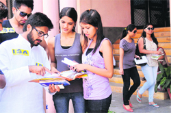 A student leader helps applicants with the admission process at DAV College, Sector 10, Chandigarh, on Thursday. Tribune photo: Pradeep Tewari