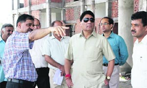 Uttarakhand Health and Sceince and Technology Minister Surinder Singh Negi inspects the Science City project near Dehradun on Thursday.