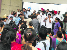 Parents protest at Ryan International School in Ludhiana on Thursday.