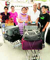 Passengers head to board the SpiceJets Amritsar-Srinagar flight at Sri Guru Ramdas Jee International Airport in Amritsar on Friday