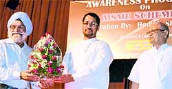 Industry Minister Anil Joshi being honoured at a seminar in Amritsar on Friday