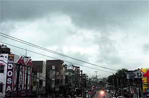 Weather turned pleasant on Friday afternoon after thick clouds gathered in the sky, hiding the sun completely. Although a cool breeze brought down the temperature by several notches, the citys hopes to get drenched in a heavy downpour were dashed as it registered only light showers