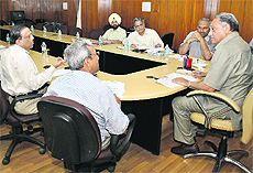 Chief Minister Vijay Bahuguna during a meeting with senior government officials in Dehradun on Friday. 
