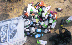 Intoxicants found dumped in fields near Dabwali in Sirsa on Friday. A Tribune photograph