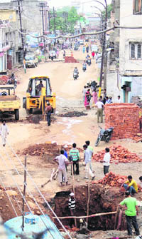 The New Plot-Janipur road was closed to traffic by the ERA as it began the last phase of sewerage laying project in Jammu on Friday. 
