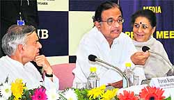 Union ministers Pawan Kumar Bansal, P Chidambaram and Ambika Soni at a press conference in Chandigarh on Friday