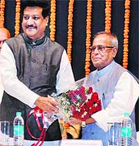 UPA presidential candidate Pranab Mukherjee being greeted by Maharashtra Chief Minister Prithviraj Chavan during a meeting in Mumbai on Friday