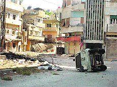 A picture released by the Syrian Opposition's Shaam News Network on Friday shows destruction in the rebellious Hama region.