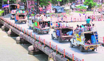 Dak Kanwariyas arrive in Haridwar to fetch Ganga water on Saturday. 