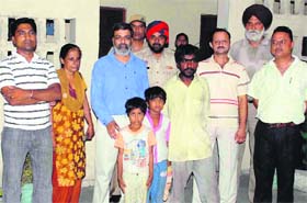 Payal and her brother Arvind with Sudama and NGOs members in Jalandhar on Friday
