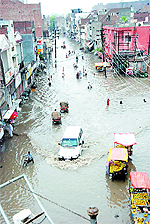 While the skies finally opened up and the city registered a good downpour, many low-lying areas of the city were inundated with rainwater. Water accumulated at many places like Sirki Bazar in Bathinda. 