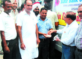 The Civil Line branch of the State Bank of Patiala (SBoP) in Bathinda organised a coin distribution mela on Friday. Coins of the denomination of Re 1, Rs 2 and Rs 5 were distributed on the occasion.