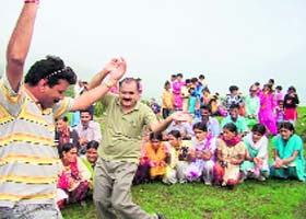 Villagers perform a dance in connection with the Devi Kol festival celebrations