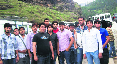 Tourists from Delhi and Gurgaon protest at the Kothi barrier in Manali.