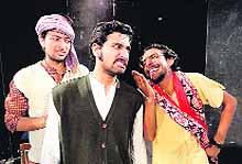 Artistes perfrorm in the play Ghar Ka Maalik at Natrang Theatre on Sunday