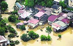 An aerial view of a flooded residential area near Kyoto on Sunday
