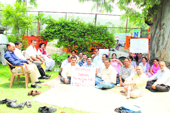 Lecturers stage a protest at the MLSM College, Sundernagar, in support of the agitating St Bede's College staff.