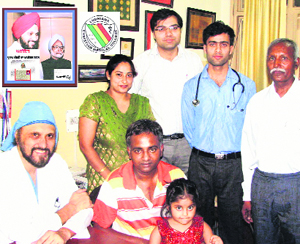 Vikas Masih with his family and doctors at the Christian Medical College and Hospital in Ludhiana.