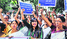 A demonstration bieng held against the molestation of a girl in Guwahati.