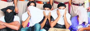 Five of the accused in police custody in Amritsar on Tuesday. 
