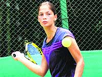 Nimrat Walia plays a shot during her under-16 match against Akshita Singh at the CLTA in Chandigarh on Tuesday