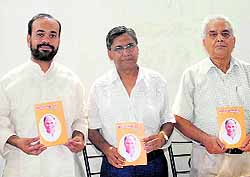 Dignitaries during the release of a book written by Dr Atul Sharma (third from left) in Dehradun on Tuesday