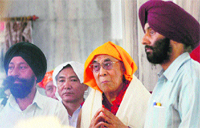 Tibetan Spiritual leader Dalai Lama during a visit to Chatti Padshahi Gurdwara in Srinagar on Tuesday.  PTI 