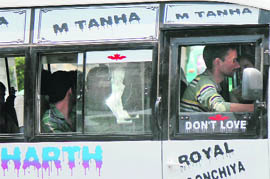 Mini-bus drivers are seldom seen wearing the mandatory khaki uniforms in Jammu. 
