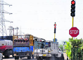 New traffic signals installed in Jammu being put through a trial. The PDD has refused to provide requisite electricity to these lights owing to power shortage. 